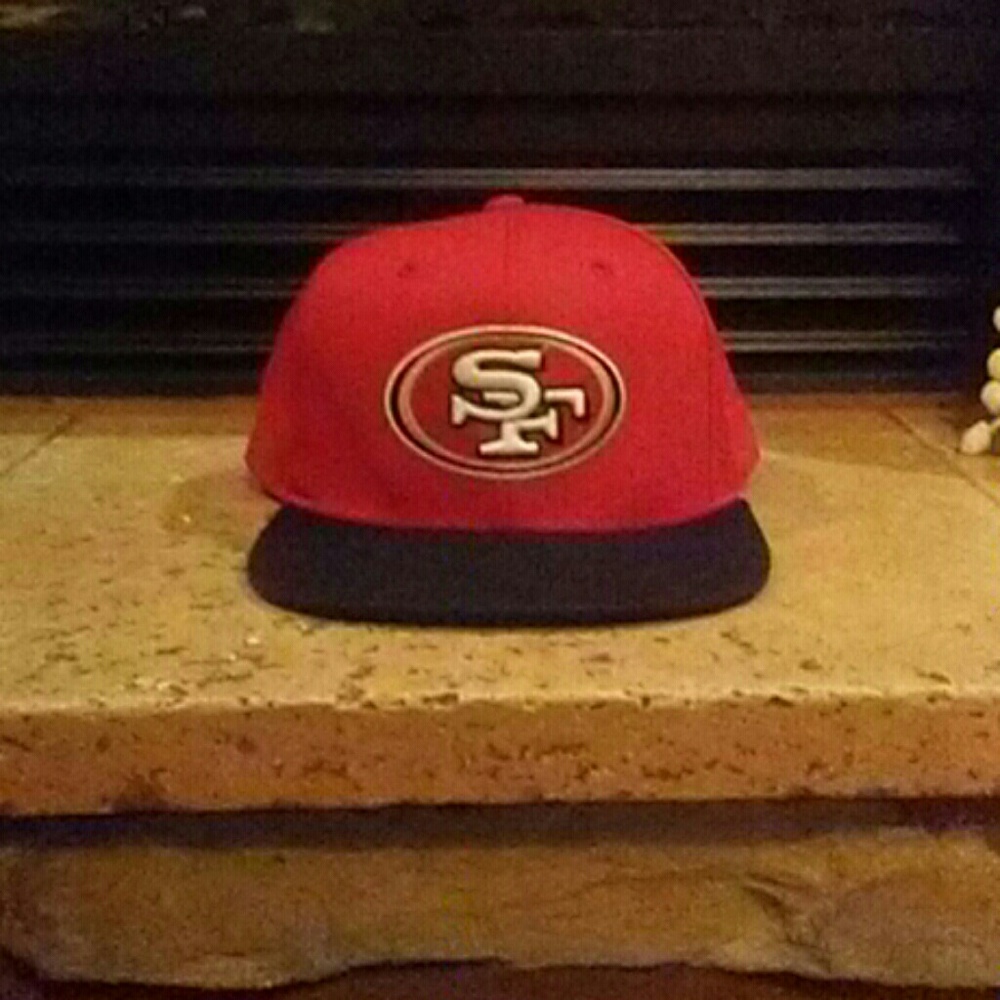 San Francisco 49ers snap back hat.